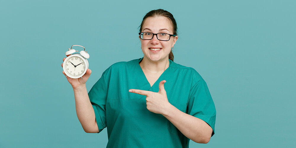 A travel nurse wearing a mask handling patient document